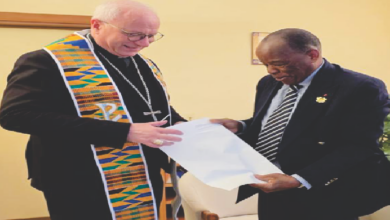 Sir Assorow presenting the request to Archbishop Baturi (wearing the stole) the Ambassador presented to him