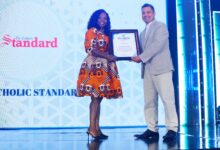 Ms. Darko receiving the award