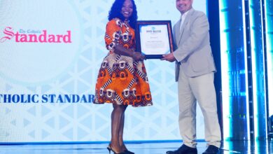 Ms. Darko receiving the award