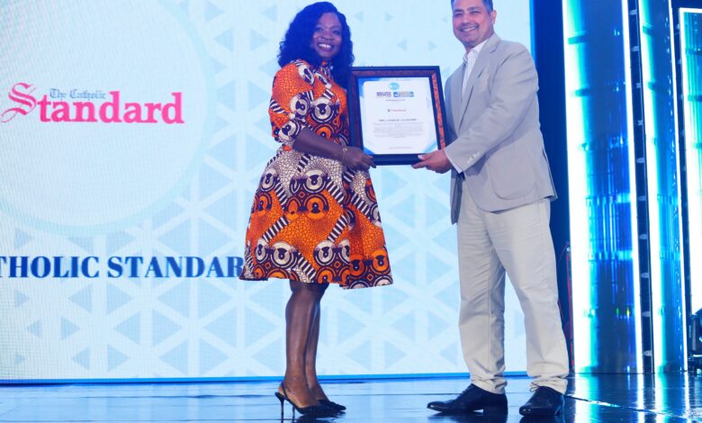 Ms. Darko receiving the award